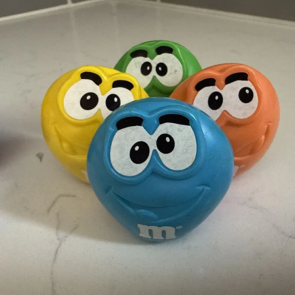 M&Ms Vintage Character Wheeled Toy 1997 and Easter Egg 1999 Burger King Mars Inc